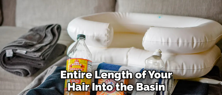 Entire Length of Your
Hair Into the Basin